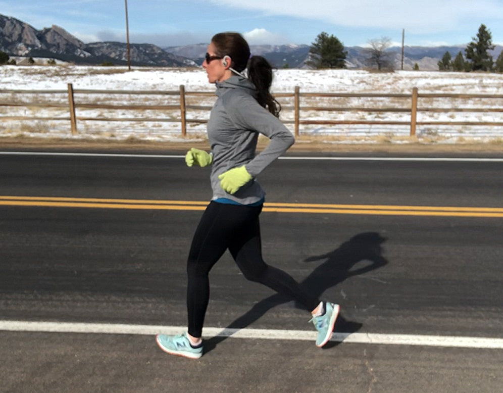 Woman running on road