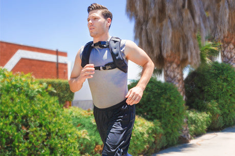 man running outdoors with prosourcefit weighted vest