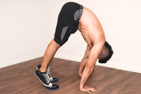 man using prosourcefit core sliders in pike pose
