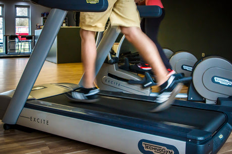 man running on treadmill