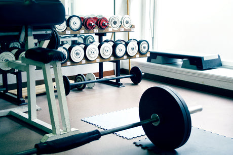 home gym with weights and barbell